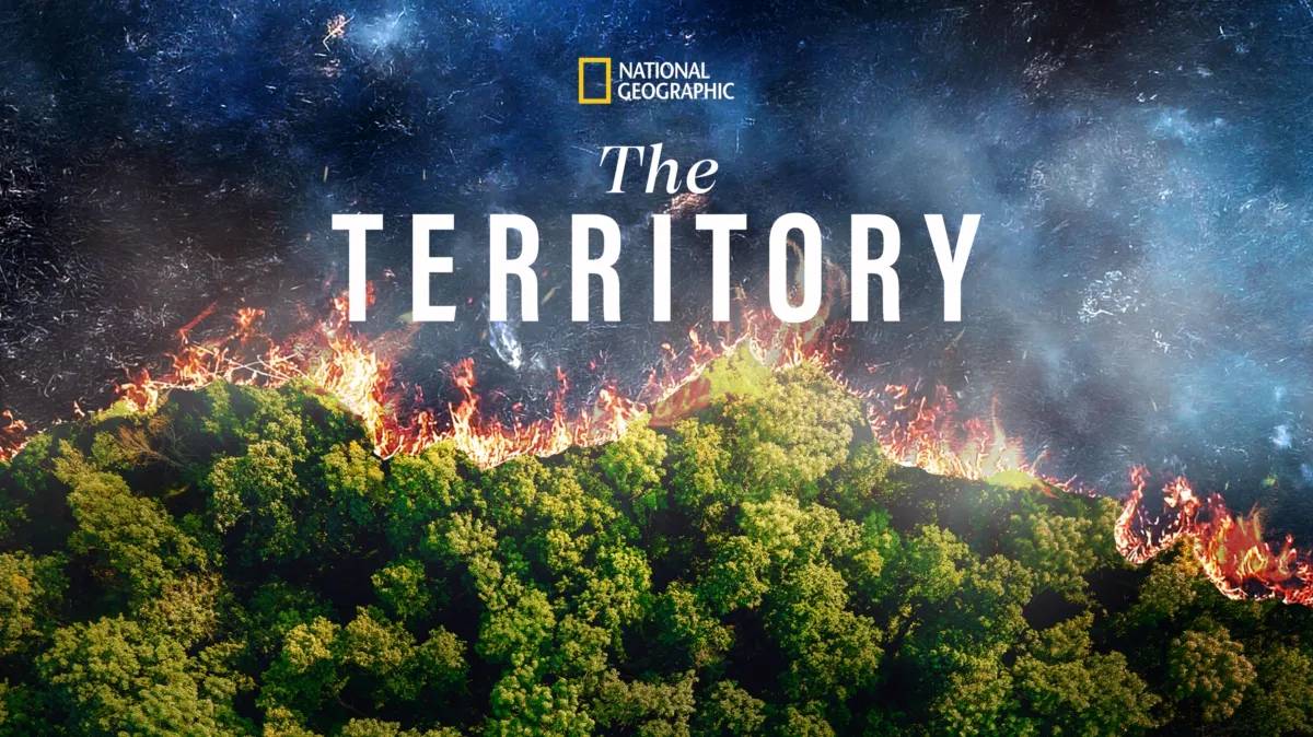 Promotional image for The Territory showing a forest with a fiery border under the National Geographic logo.